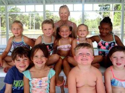 Young Beginner Class  with Ms. Carol Evans, club swim instructor for over 30 years!